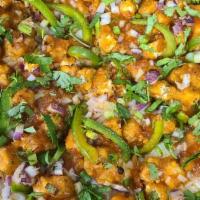 Chili-Dragon Pizza (Indian-Chinese) · Battered fried chicken, custom cheese blend, red dragon sauce, green bell peppers, red onion...
