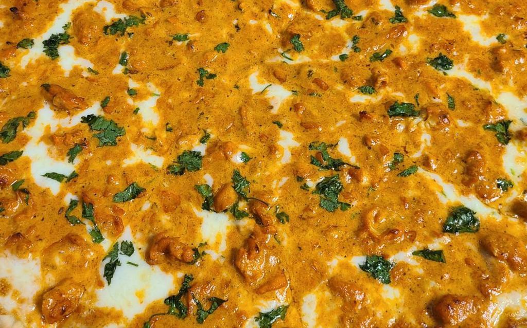 Tikka-Masala Pizza (Indian) · Marinated grilled chicken, tikka masala gravy, cilantro.
* Available with soy veggie cutlet for the vegetarian options.