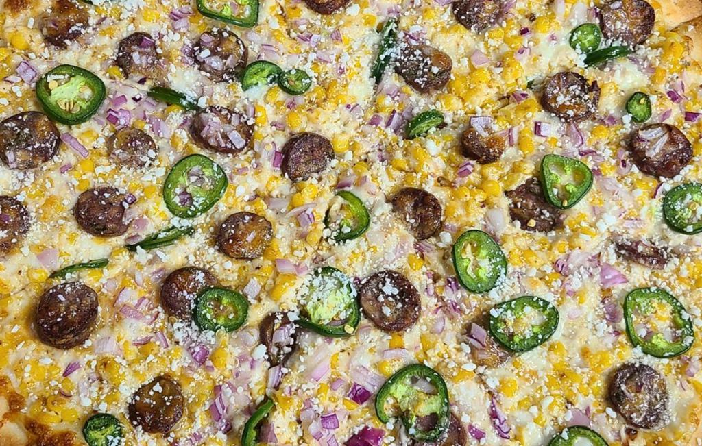 Mexi-Corn (Mexican) · Creamy elote style corn, smoked beef sausage, custom cheese blend, red onions, jalapenos, cotija cheese