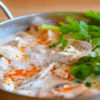 Tom Kha · Savory Thai style coconut soup with coconut milk, mushrooms, lemongrass, galanga, kaffir lim...
