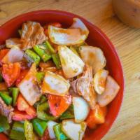 Sweet and Sour Sauce · Sauteed with onions, green bell peppers, tomatoes, pineapple and cucumbers.