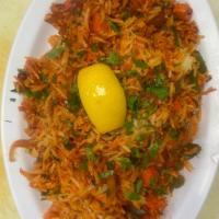 94. Chicken Biriyani · Classic dish of curried rice with chicken and vegetables.