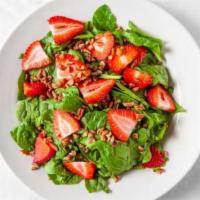 Strawberry Pecan Salad · Fresh spinach, raw pecans, topped with fresh sliced strawberries and drizzled with balsamic ...