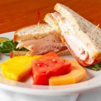 Turkey Special Sandwich · Fresh roasted turkey, tomato, lettuce and Swiss with balsamic mayo on wheat.