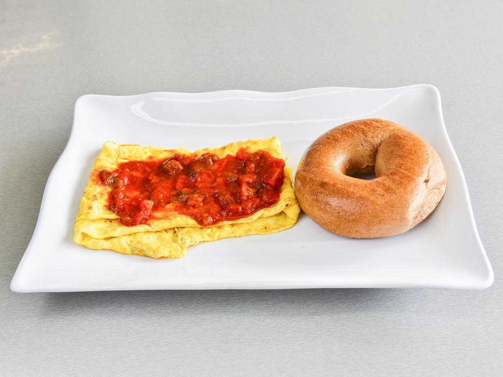 Spanish Omelet · Peppers, onion, mushrooms and cheese with picante tomato salsa. Served with a choice of a bagel or bread.