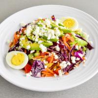 Avocado Salad · Fresh iceberg lettuce, red cabbage, tomatoes, cucumbers, avocado, feta and hard boiled egg w...