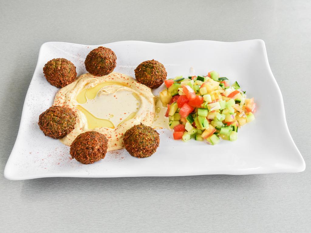 Falafel Plate · 5 falafel balls served with hummus, tehina, Israeli salad and pita bread. Vegan. 