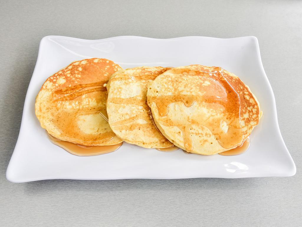 Buttermilk Pancakes · 3 pancakes served with maple syrup on side.