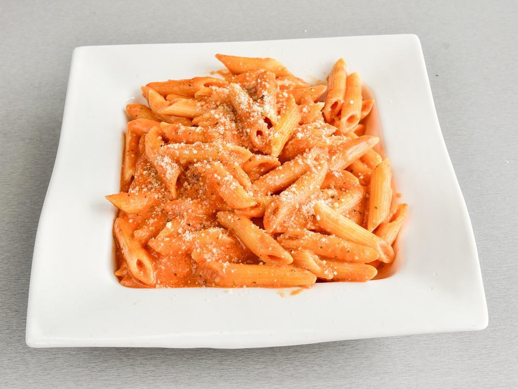 Penne A La Vodka · Penne in a creamy pink sauce with a touch of vodka.