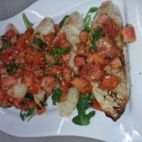 Bruschetta · Toasted ciabatta bread, fresh tomatoes and basil