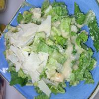 Ceasar salad · Romaine lettuce, croutons, Parmesan shaves and Ceasar dressing