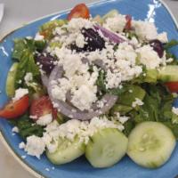 Greek Salad · Tomato, cucumber, feta cheese, red onions, black olives, balsamic dressing