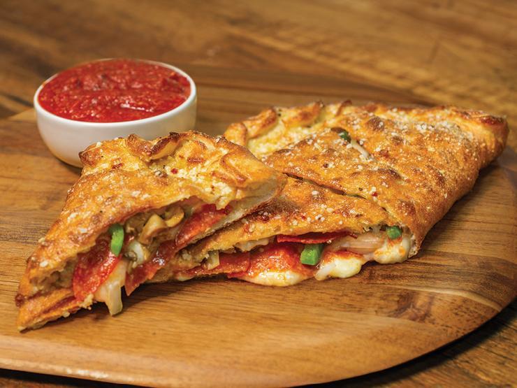Build Your Own Calzone · Our handmade dough stuffed with our signature 3cheeses plus up to 5 toppings of your choice; served with a side of our original sauce.