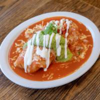 Special Mojado Wet Burrito · Choice of meat, rice, beans, topped with enchilada sauce, melted cheese, guacamole, sour cre...