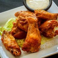 Wing-O-Zone · Chicken wings served with Jamaican jerk dry rub.
