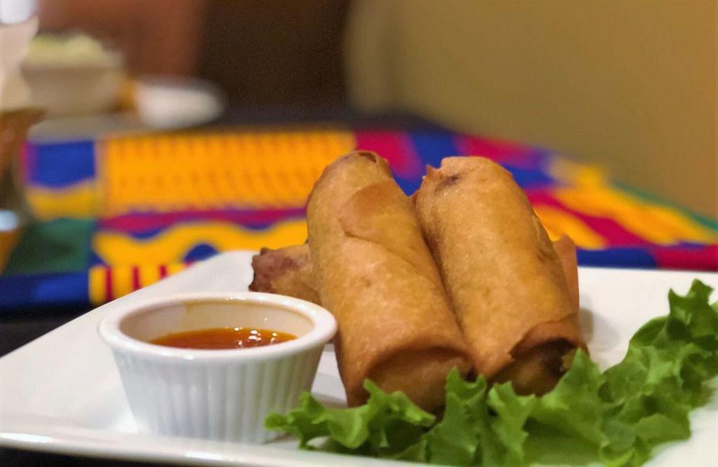 Spring Rolls · Served with hot sauce. Make it vegetarian for no extra charge.