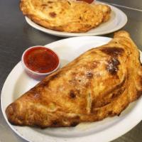 Otto Calzone · Choice of 3 toppings, ricotta and mozzarella.