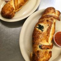 Meat Pizza Roll · Choice of one meat topping, mozzarella, mushroom, and tomato.