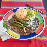 Carne asada · 16 onz skir steak served with rice and beans guacamole and pico with 3 tortilla