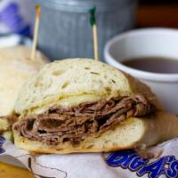 French Dip Sandwich · Culinary inspired prime sirloin, Swiss cheese, hoagie bread and au jus. Horseradish sauce on...