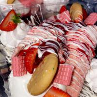 Cheesecake Cones · Strawberry shortcake cheesecake pan topped with delicious fresh slice strawberries.