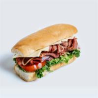 #25 Pastrami Sub Lunch · French roll, pastrami, lettuce, tomato, grilled onions, cheese, mustard, mayo.