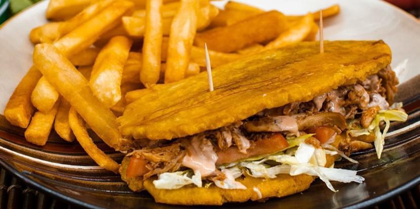 Favorite Combo #4 · Patacon combo: plantain sandwich, french fries and soft drink can.