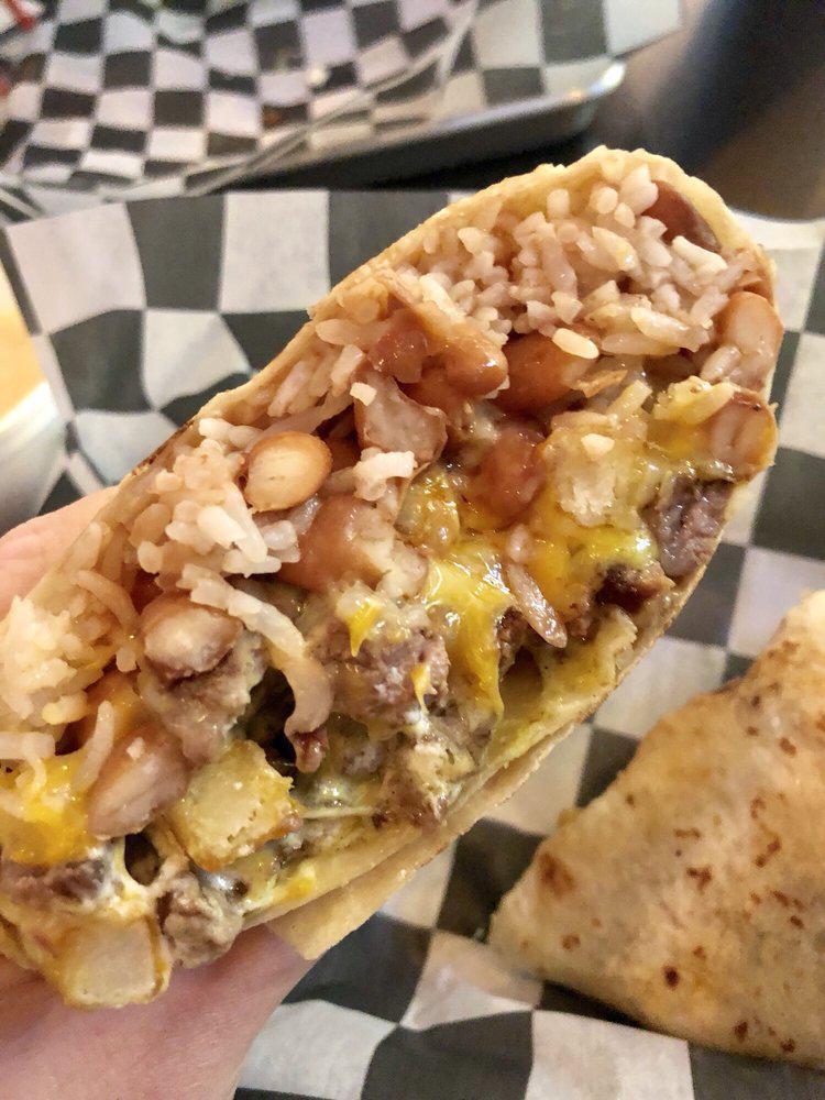 Burrito California · Grilled outside skirt steak or chicken, cilantro rice, black or pinto beans, french fries, American cheddar cheese, crema mexicana and salsa jalapeno.