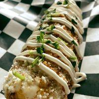 ELOTE · CORN ON THE COB WITH MAYO, COTIJA CHEESE, CHILE POWDER, SOUR CREM AND CILANTRO