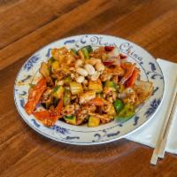 Kung Pao Chicken · Chicken diced and sauteed with chili peppers, celery, onion bell pepper, water chestnut, pea...