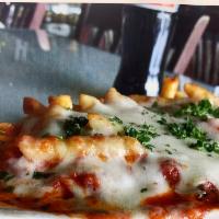 Baked Penne · Penne and marinara sauce baked with mozzarella and Parmesan.