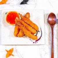 Shrimp Tempura · 5 pcs of fresh jumbo shrimp deep-fried in tempura style served with sweet chili sauce.