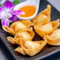 Crab Rangoon · 6 pieces. Crab meat, corn and cream cheese wrapped in egg roll skin, deep-fried and served w...