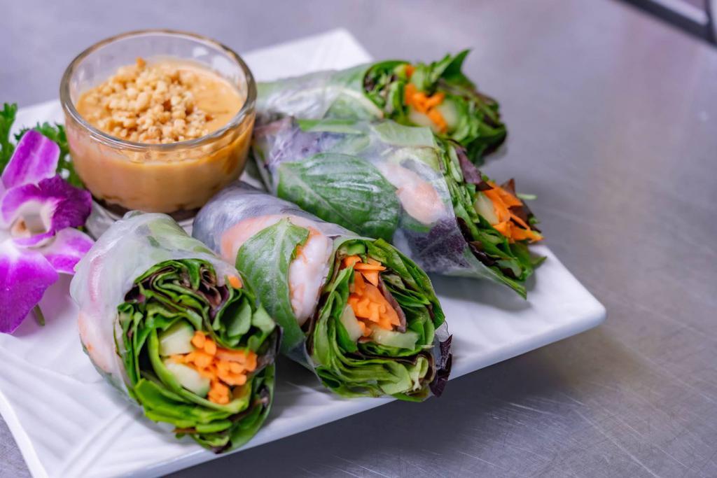 Fresh Rolls · 2 pieces. Soft rice paper wrapped over shrimp, carrots, lettuce, cilantro and basil leaves, served with peanut ginger sauce.