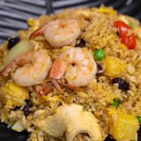  Pineapple Fried Rice · Fried rice with chicken, shrimp, pineapple, egg, onions, raisins, green peas, cherry tomato ...