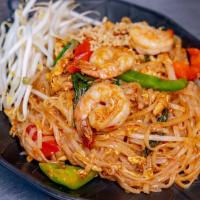  Fiery Pad Thai Noodles · Pad Thai noodles with chicken, shrimp, egg, basil, peppers, bean sprouts, scallions and grou...
