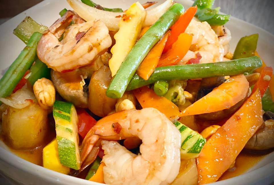Shrimp Paradise  · Shrimp with assorted vegetables, pineapple and cashew nuts in spicy sauce.
