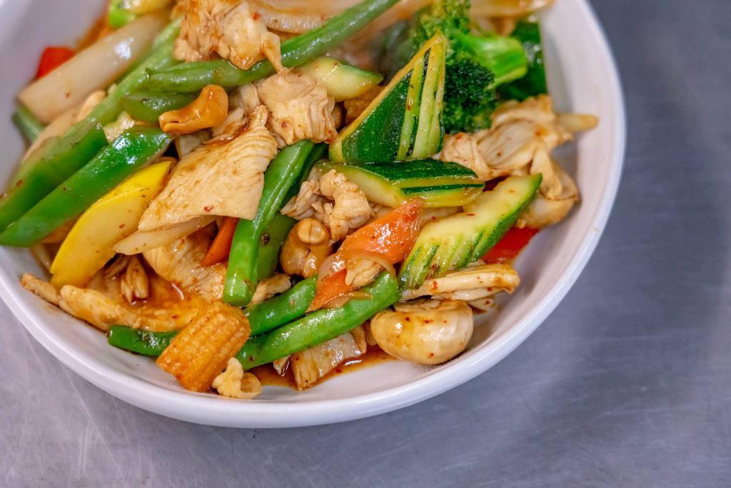 Cashew Nut Stir-Fry · Fresh assorted vegetables stir-fried with scallions, cashew nuts and pineapple in chili paste. Spicy.