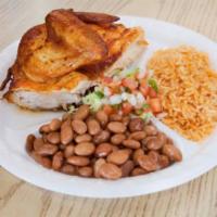Roasted Chicken Plate · Roasted chicken with rice, beans, pico de gallo and your choice of tortillas. Choose between...