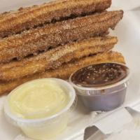Churro · 3 churros includes two dips 
