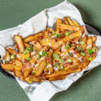 Cheddar Bacon Beer Battered Fries · Our beer-battered fries, fried crispy and topped with cheddar and hardwood smoked bacon and ...
