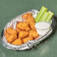 Boneless Wings · All white meat boneless chicken fritters oven baked and fried crispy, then tossed in sauce o...