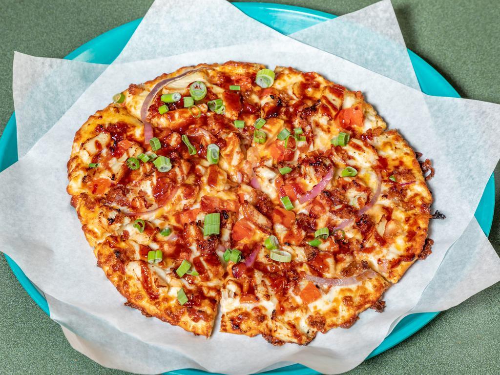 BBQ Chicken Pizza Special · Chicken, bacon, cheddar cheese, tomatoes, red and green onions, on BBQ ranch sauce topped with sweet and tangy BBQ sauce.
