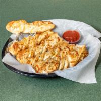 Garlic Parmesan Twists · Fresh dough with our creamy garlic sauce, fresh garlic, our 3 cheese blend, and our Italian ...
