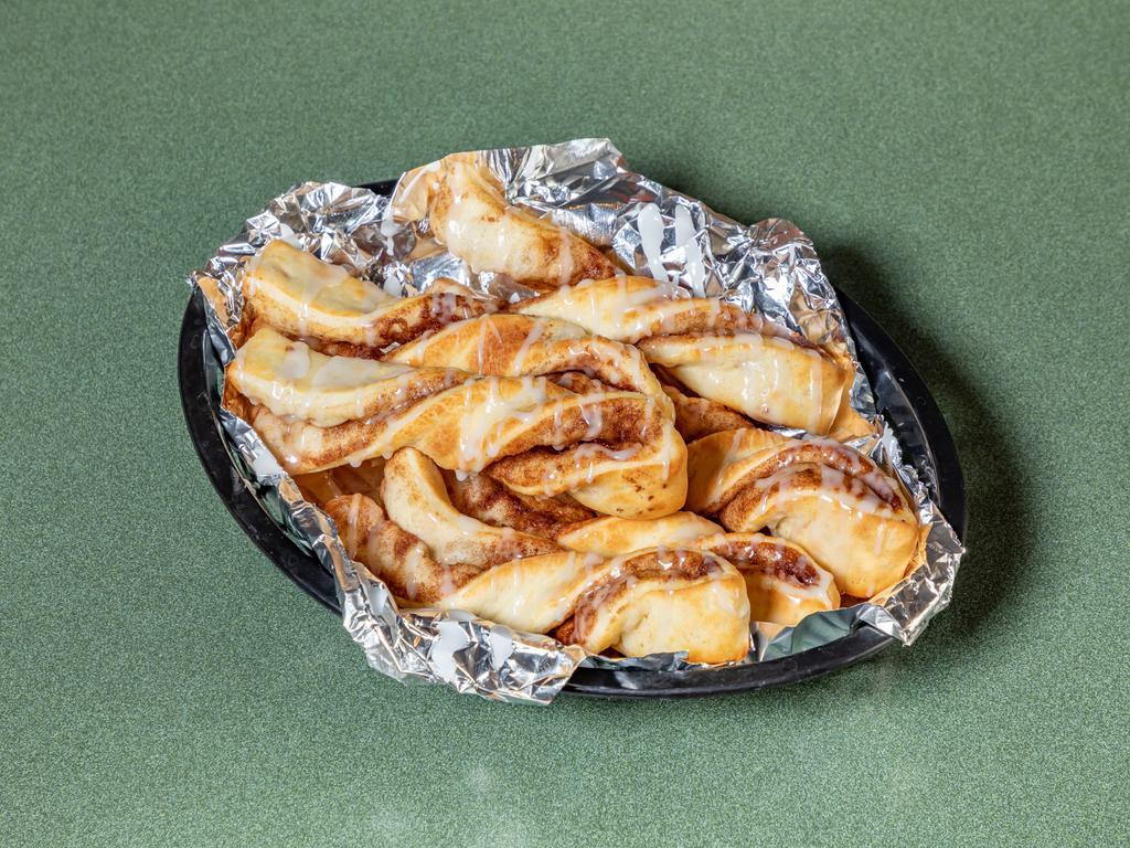 Cinnamon Twists · Our famous twists rolled with a brown and white sugar-cinnamon mixture and topped with a delicious powdered sugar glaze.