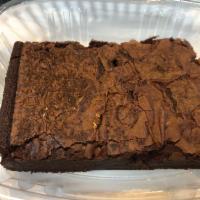 Brownie · A Delicious dense and moist chocolate brownie.