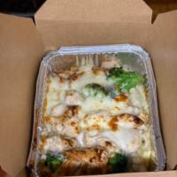 Chicken Broccoli Alfredo Pasta · Grilled marinated chicken, fresh broccoli and homemade Alfredo sauce served on a bed of ziti.