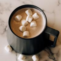 Hot Chocolate · White and dark chocolate in steamed milk with toasted marshmallow on top