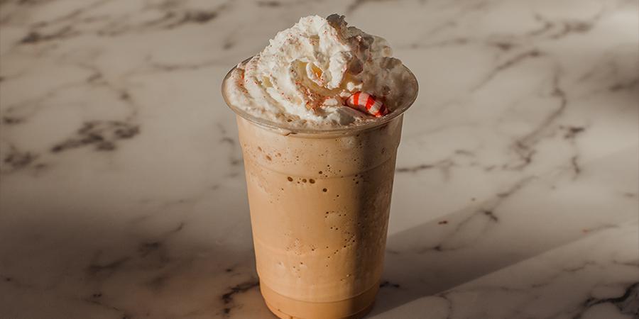 Peppermint Mocha Frappe · Delicious peppermint, mocha, cold brew &
milk blended, topped with whipped
cream and crushed peppermints! 