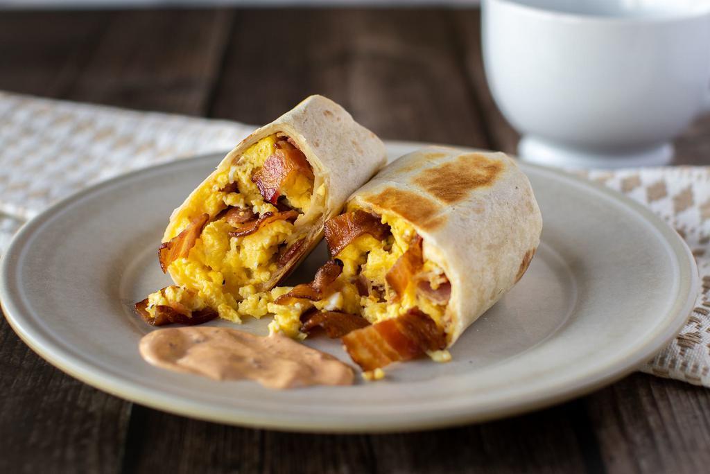 Kansas Burrito · Crispy bacon, scrambled eggs and lots of melty cheese